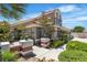Traditional home featuring mature landscaping and stucco privacy wall at 8437 Apple Hill Ct, Las Vegas, NV 89128