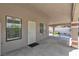 Covered front porch with columns with tile accents and shade at 8437 Apple Hill Ct, Las Vegas, NV 89128