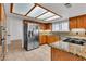 Bright kitchen featuring granite counters, stainless steel appliances, and recessed lighting at 8437 Apple Hill Ct, Las Vegas, NV 89128