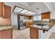 Well-lit kitchen featuring granite countertops and stainless steel appliances at 8437 Apple Hill Ct, Las Vegas, NV 89128