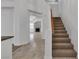 Carpeted staircase offers a smooth transition to the upper levels of the home at 8437 Apple Hill Ct, Las Vegas, NV 89128