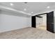Spacious finished basement featuring recessed lighting and wood-look flooring at 8713 Castle Ridge Ave, Las Vegas, NV 89129
