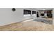 Finished basement with wood-look flooring, window, and plenty of natural light at 8713 Castle Ridge Ave, Las Vegas, NV 89129