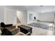 Finished basement with an office setup, carpet, and wood-look flooring at 8713 Castle Ridge Ave, Las Vegas, NV 89129