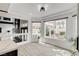 Bright breakfast nook with ample natural light and an open layout to the kitchen and living space at 8713 Castle Ridge Ave, Las Vegas, NV 89129