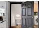 Hallway leading to the laundry room, with a partial view of the staircase at 8713 Castle Ridge Ave, Las Vegas, NV 89129