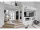 Bright living area showcases open floor plan and access to second floor at 8713 Castle Ridge Ave, Las Vegas, NV 89129