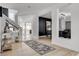 Bright entryway showcasing open floor plan and access to a dining area at 8713 Castle Ridge Ave, Las Vegas, NV 89129
