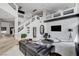 Bright living room showcases an open floor plan and modern decor at 8713 Castle Ridge Ave, Las Vegas, NV 89129