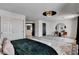 Main bedroom with large closet, decorative lighting, and modern design at 8713 Castle Ridge Ave, Las Vegas, NV 89129