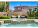 Beautiful pool and spa with lush landscaping providing a private and serene outdoor space at 8713 Castle Ridge Ave, Las Vegas, NV 89129