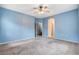 Large bedroom featuring doorways to the hallway and an adjacent room at 9303 Gilcrease Ave # 1056, Las Vegas, NV 89149