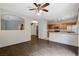 Open living space featuring an archway, kitchen, and an airy atmosphere at 9303 Gilcrease Ave # 1056, Las Vegas, NV 89149