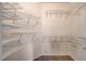 Spacious walk-in closet with multiple shelves for ample storage space at 9303 Gilcrease Ave # 1056, Las Vegas, NV 89149