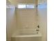 Bright bathroom showcasing a tiled shower-over-tub combo and convenient shower fixture at 9452 Plover Falls Ave, Las Vegas, NV 89149