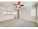 Large bonus room with neutral carpet, ceiling fan, and natural light at 9452 Plover Falls Ave, Las Vegas, NV 89149
