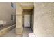 Close up of the home's front door and entryway with stone walkway at 9452 Plover Falls Ave, Las Vegas, NV 89149
