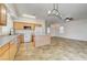 Open-concept kitchen with center island offers a seamless transition to the adjacent living area at 9452 Plover Falls Ave, Las Vegas, NV 89149