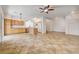 Open-concept kitchen featuring a center island, stainless steel appliances, and ample cabinet space at 9452 Plover Falls Ave, Las Vegas, NV 89149