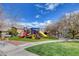Community playground features slides, climbing structure, and green turf at 9452 Plover Falls Ave, Las Vegas, NV 89149