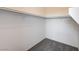 Spacious walk-in closet with sturdy shelving and plush carpeting, offering ample storage space at 9452 Plover Falls Ave, Las Vegas, NV 89149