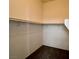 Spacious walk-in closet with shelving and rod for ample storage at 9452 Plover Falls Ave, Las Vegas, NV 89149