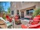 Inviting backyard featuring a cozy patio and fire pit with ample seating, perfect for outdoor enjoyment at 10692 Tulip Valley Rd, Las Vegas, NV 89179