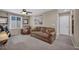 Bonus room with a cozy seating area and a functional built-in desk and storage area at 10692 Tulip Valley Rd, Las Vegas, NV 89179