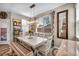 The dining room features a rustic wood table, modern light fixture, and stylish decor at 10692 Tulip Valley Rd, Las Vegas, NV 89179
