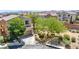 Two-story home featuring mature landscaping and desert landscaping at 10692 Tulip Valley Rd, Las Vegas, NV 89179