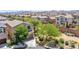 Charming home featuring drought-tolerant landscaping, a tile roof, an attached garage, and a neighborhood view at 10692 Tulip Valley Rd, Las Vegas, NV 89179