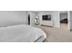 Spacious bedroom featuring a king-size bed, dresser, and closet at 10836 Montana Blanca Ave, Las Vegas, NV 89166