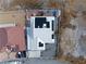 Aerial view of this property with solar panels on a bright white roof at 1261 S Comstock St, Pahrump, NV 89048