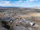 Aerial view of the community with desert landscape around the homes at 1261 S Comstock St, Pahrump, NV 89048