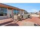 This brick back patio features outdoor seating, hot tub and desert views at 1261 S Comstock St, Pahrump, NV 89048