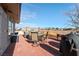 This back patio features brick, outdoor seating, and a grill at 1261 S Comstock St, Pahrump, NV 89048