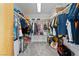 Walk-in closet with built-in shelves, racks, and ample storage for clothing at 1261 S Comstock St, Pahrump, NV 89048