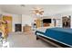 Spacious main bedroom with a media center, closet, and carpet flooring at 1261 S Comstock St, Pahrump, NV 89048