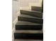 Detailed view of the hardwood stairs showcasing quality craftsmanship and design at 1482 Flintrock Rd, Henderson, NV 89014