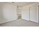 Neutral bedroom with closet and access to other rooms at 1604 Tamborine Ct, Las Vegas, NV 89128