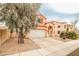 Two story home with large driveway at 1604 Tamborine Ct, Las Vegas, NV 89128