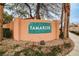Neighborhood sign in front of foliage at 1604 Tamborine Ct, Las Vegas, NV 89128
