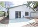 Backyard features a sliding glass door entry, windows, and access to the carport at 1878 Corvette St, Las Vegas, NV 89142