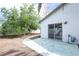 A sliding glass door provides backyard access in this home with a large concrete patio at 1878 Corvette St, Las Vegas, NV 89142