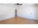 Spacious living room with wood floors and a white door at 1878 Corvette St, Las Vegas, NV 89142