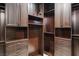 This walk-in closet provides ample shelving and drawer space, offering storage and organization solutions at 20 Via Paradiso St, Henderson, NV 89011