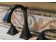 Close up of tile detailing surrounding faucet with the word 'Brizo' engraved on it at 20 Via Paradiso St, Henderson, NV 89011