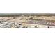 Scenic aerial view of a bustling city with a major railway line and numerous parking lots at 200 Hoover Ave # 1905, Las Vegas, NV 89101