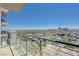 Balcony view features a stunning city skyline, with buildings and mountains on a bright day at 200 Hoover Ave # 1905, Las Vegas, NV 89101
