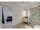 Open bathroom layout with walk-in shower and bedroom access at 200 Hoover Ave # 1905, Las Vegas, NV 89101